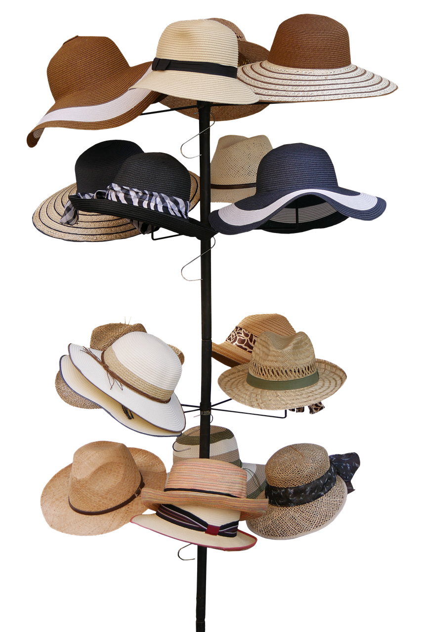 A rack of a variety of hats,  Image by G.C. from Pixabay